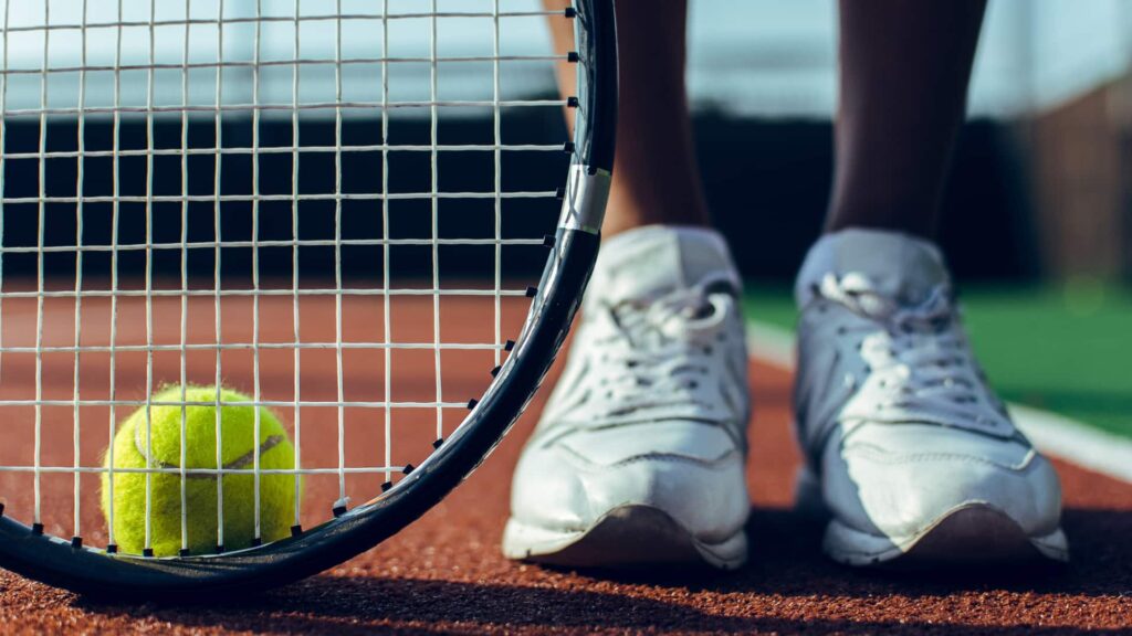 Assurance tennis professeur